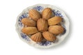 Plate with fresh baked French madeleines