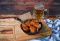 A plate of fresh, hot, crispy fried chicken with red sause on a Royalty Free Stock Photo