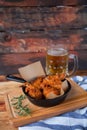 A plate of fresh, hot, crispy fried chicken with red sause on a Royalty Free Stock Photo