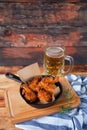 A plate of fresh, hot, crispy fried chicken with red sause on a Royalty Free Stock Photo