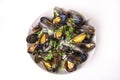 Plate of fresh mussels with onion and parsley mignonette