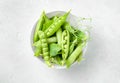 plate with fresh pea pods Royalty Free Stock Photo