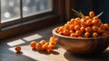 plate with fresh sea buckthorn in the kitchen healthy window organic autumn