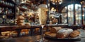 A plate of freshly baked bread sits beside a glass of effervescent champagne, creating a delightful contrast of textures