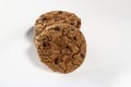 Plate of freshly baked chocolate chip cookies. White background, selective focus Royalty Free Stock Photo