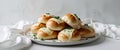 a plate of freshly made cheese bread rolls Royalty Free Stock Photo