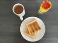 Freshly toasted bread with a cup of tea