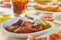 Plate of fried bbq chicken wings with ranch and celery Royalty Free Stock Photo