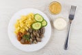 Fried chicken hearts, pasta, baked eggplants, cucumbers, mustard