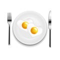 Plate With Fried Egg Heart Fork And Knife White Background-