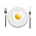 Plate With Fried Eggs Fork And Knife White Background