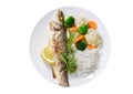 plate of fried fish, rice and vegetables isolated on a white background Royalty Free Stock Photo