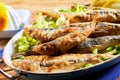 Plate of fried sardines, pilchards or anchovies Royalty Free Stock Photo