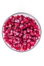 Plate frozen red currants on a white background. Harvesting of berries for the winter. Royalty Free Stock Photo