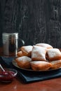 New Orleans Style Beignets, Fritters with Powdered Sugar and Raspberry Sauce