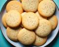 a plate full of cookies on a blue background