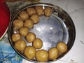 A plate full of fresh and round Besan Ladoo- an old sweet dish of India. Royalty Free Stock Photo