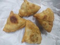 A plate full of homemade fried Indian snack- Samosa