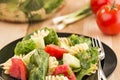 Plate full of spinach and rotini pasta salad Royalty Free Stock Photo