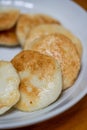 A plate of golden and delicious hand-made cuttlefish cake Royalty Free Stock Photo