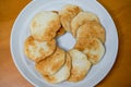 A plate of golden and delicious hand-made cuttlefish cake Royalty Free Stock Photo