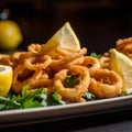 A plate of golden fried calamari rings