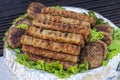 Plate with grilled kebabs and meatballs