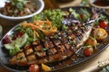 Plate of grilled Saba fish with teriyaki sauce, served with assorted vegetables