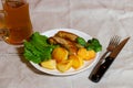 Grilled sausages and mug of beer. Selective focus Royalty Free Stock Photo