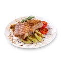 Plate of grilled steak meat with vegetables on white background Royalty Free Stock Photo