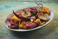 Plate with grilled vegetables on shabby table Royalty Free Stock Photo