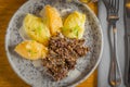 Plate of haggis neeps and tatties seerved with a whisky sauce