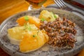 Plate of haggis neeps and tatties seerved with a whisky sauce