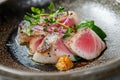 A plate of hamachi kama with grilled yellowtail collar. Royalty Free Stock Photo