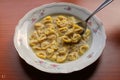 Plate of handmade tortellini, typical Italian food