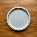 The plate has a subtle texture and simple design, with no additi Royalty Free Stock Photo