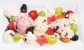 Plate of healthy fresh fruit salad with ice cream. Top view Royalty Free Stock Photo