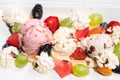 Plate of healthy fresh fruit salad with ice cream. Top view Royalty Free Stock Photo