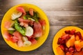 Plate of healthy fresh fruit salad on wooden background Royalty Free Stock Photo