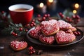 A plate of heart-shaped cookies decorated with red icing and white patterns. Homemade baking. Valentine's Day Royalty Free Stock Photo