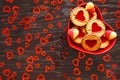 Plate of heart shaped cookies is on the table in celebration of Valentine`s day Royalty Free Stock Photo