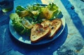 a plate of heart shaped toast with salad and lettuce Royalty Free Stock Photo