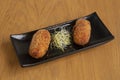 Plate of homemade ham croquettes, typical Spanish dish