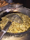 Pasteles de perro traditional corn doug fried snacks on a old carbon based stove Royalty Free Stock Photo