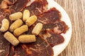 Plate of Iberian acorn loin slices to take Royalty Free Stock Photo