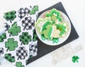 Plate of Irish Goodies with Shamrock Towel on White