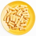 Plate of italian rigatoni pasta over white isolated background Royalty Free Stock Photo