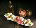 Plate of jamÃÂ³n with small loafs Royalty Free Stock Photo