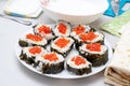 Plate with Japanese sushi and red caviar Royalty Free Stock Photo