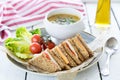 Fresh cut sandwich bowl of vegetable soup Royalty Free Stock Photo